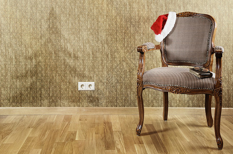 圣诞老人的臂椅 镂空 新年树 新年 老的 圣诞帽 座位 阴影背景图片