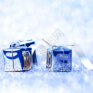圣诞礼物 冬天 弓 闪光 盒子 假期 庆典背景图片