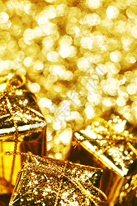 圣诞礼物 金的 丝带 闪光 金子 闪亮的 黄色的背景图片