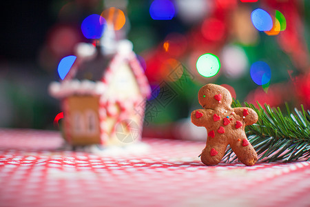 姜树红人背景 糖果生姜屋和圣诞树灯 装饰风格 饼干高清图片