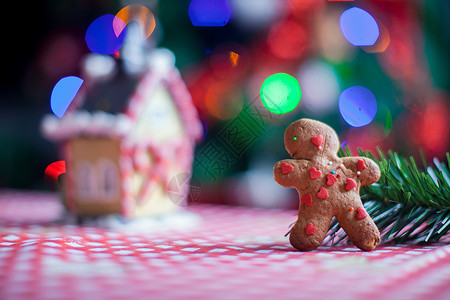 姜树红人背景 糖果生姜屋和圣诞树灯 面包 童话高清图片