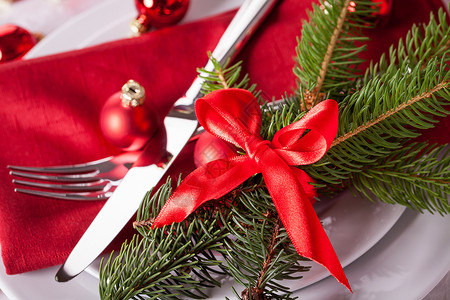 红洗圣诞场所布置 假期 刀具 燃烧 美丽的 茶灯图片