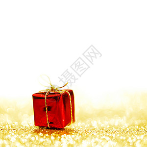 带节日 gif 的盒子 火花 问候语 黄色的 金子 闪光背景图片