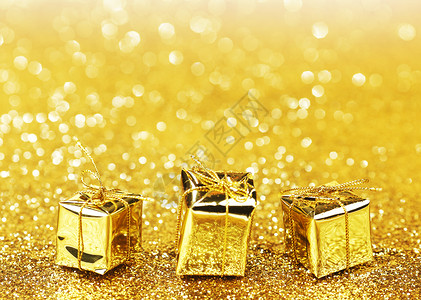节日礼物盒 闪亮的 圣诞节 黄色的 问候语 周年纪念日 金子 装饰风格背景图片