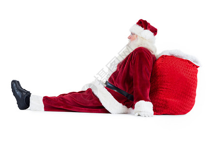 圣诞老人坐在背包上 喜庆 胡须 远眺 化装舞会服装 快乐 剪下背景图片