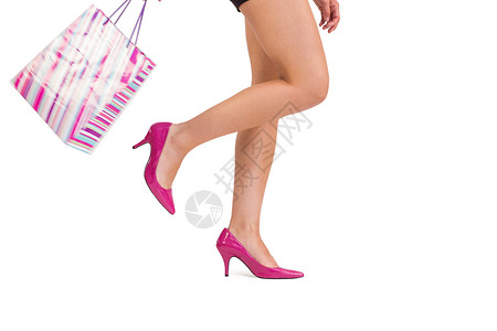 穿着高跟鞋的女子腿 圣诞节 零售 喜庆 剪下 购物狂 购物袋背景图片