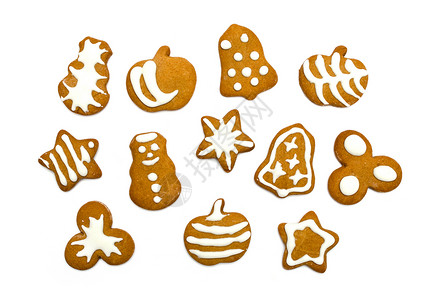 白背景的姜饼饼干   甜食 雪人 摄影 传统的背景图片