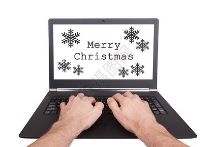 屏幕雪花在笔记本电脑上工作的人 圣诞快乐背景