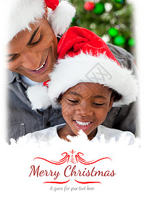 父亲字体父亲和女儿在圣诞节礼物上玩耍的画像综合图象 孩子背景