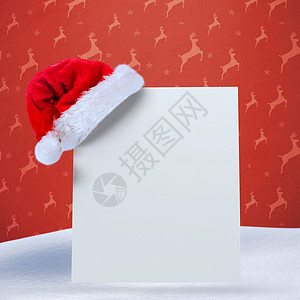海报上圣塔帽的复合图像 圣诞帽 驯鹿 橙子 圣诞节的时候 计算机绘图背景图片