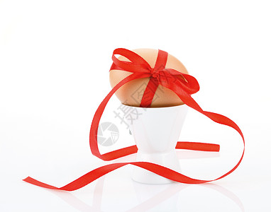 节日鸡蛋 白色的 优雅 闪亮的 丝带 弓 礼物 巧克力背景图片