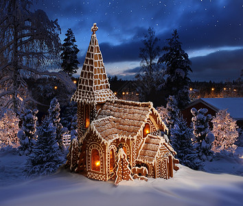 雪地上的姜饼教堂 圣诞夜风景背景图片