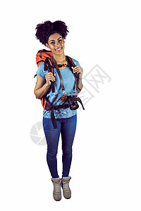 一名年轻女性的肖像 手持照相机和背包 照片背景图片