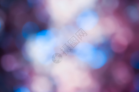 蓝和紫紫周bokeh背景摘要 金的 星星背景图片