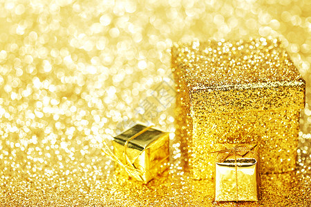 节日礼物盒 卡片 闪亮的 新年 惊喜 金子 问候语背景图片