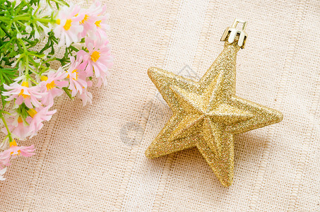 金色五角星的圣诞装饰背景图片