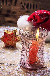 圣诞钟和蜡烛 持有者 明信片 火 传统 情绪 十二月 节背景图片