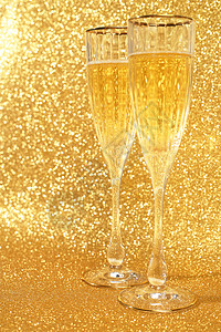 香槟玻璃杯 圣诞节 天 葡萄酒 酒精 闪闪发光 闪光 金的背景图片