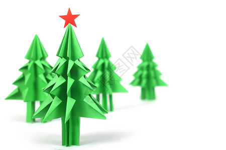 圣诞树折纸 森林 日本 星星 假期 新年 绿色的背景图片