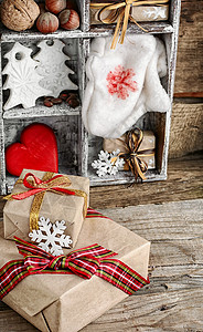 圣诞节的装饰 连指手套 装饰品 老式的 围巾 复古的背景图片