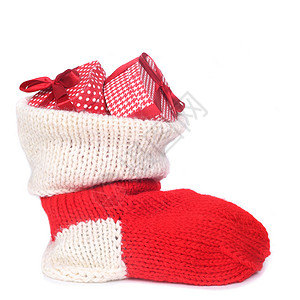 圣诞红袜袜 丝带 惊喜 庆典 礼物 白色的 新年 假期背景图片