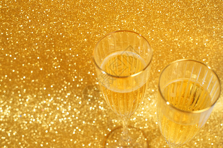 香槟玻璃杯 庆典 浪漫的 葡萄酒 情人节 派对 圣诞节 金子背景图片