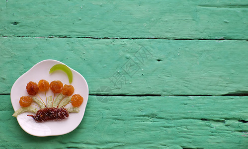 越南给泰特的食品 保存果果酱 月球 椰子 白盘子背景图片