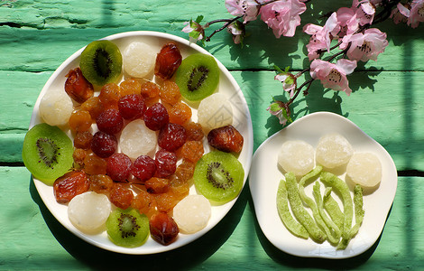 越南越战节越南果酱 春节 吃 越南菜 李子酱 盘子 水果背景图片