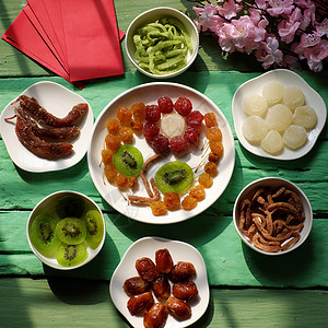 越南越战节越南果酱 亚洲 盘子 传统 新年快乐 奇异果背景图片