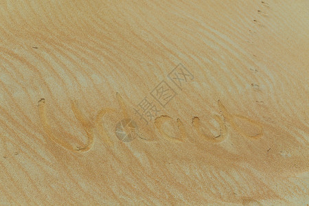 节日标题字德国节日的沙子字 正面情绪 情感 旅游 壳 海岸 爸爸背景