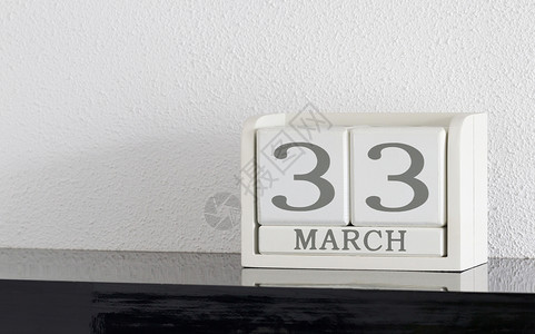 白色块日历当前日期 33 和月份 3 月 - 额外的一天 假期 会议背景图片