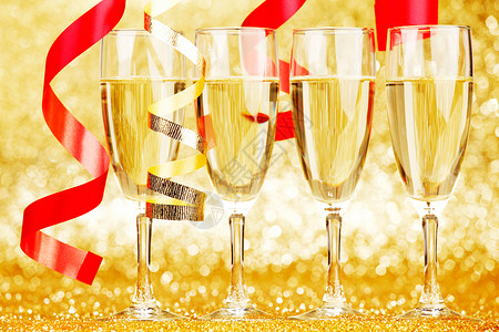 香槟和丝带 庆典 庆祝 香槟酒 玻璃 金子 金的背景图片