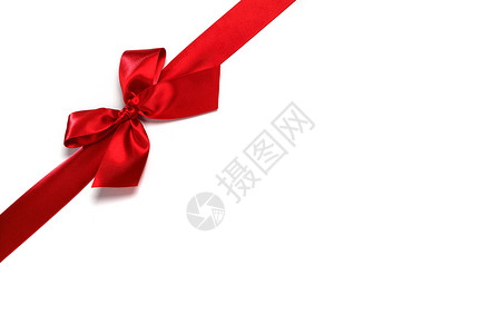 装饰性红沙丁鱼弓 假期 周年纪念日 边界 圣诞节 婚礼 丝绸背景图片