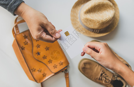 顾客在购物时用信用卡支付订货单的费用m 快乐的背景