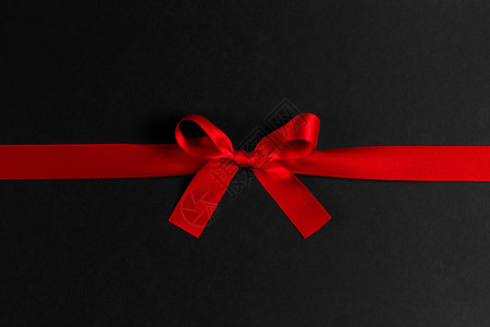 红色刺带蝴蝶结弓 装饰风格 庆典 展示 边界 闪耀 华丽的背景图片