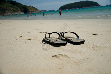 沙滩上的山地 闲暇 翻动 支撑 夏天 凉鞋 失败背景图片