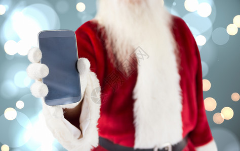 显示智能手机的综合图像 圣诞老人 圆圈 乔利 圣诞节背景图片