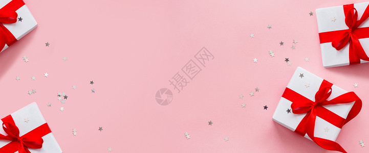 粉红背景wi上白包装纸上的赠品横幅 Banner 背景图片