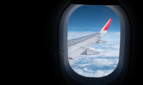 翅膀广告素材从平面窗口和 TRA 时的天空美丽的空中视图背景