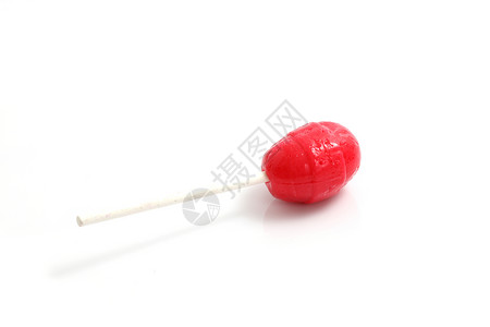 在白色背景中孤立的红色糖果背景图片