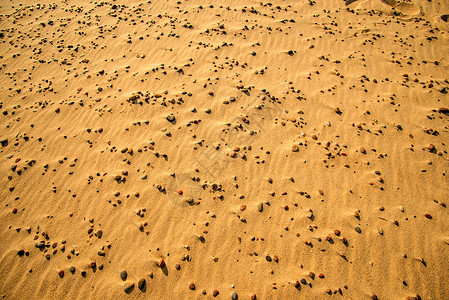沙沙沙沙滩上的小石子 夏天 混合的 材料背景图片