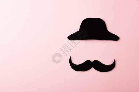 黑胡子和帽子 在粉红色上孤立的摄影棚拍摄背景图片