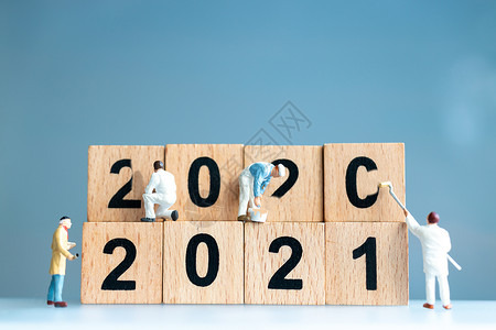 2020年总结2021年计划2021年涂漆并删除2020年的微型工人团队 木头 圣诞节背景