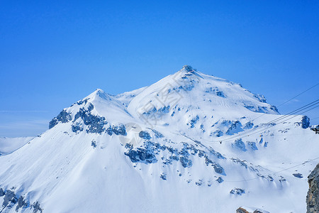 富龙滑雪场瑞士天空线从西边的天线上的 雪丘 阿尔卑斯山 季节背景