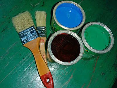 在锅中刷刷和刷刷多油漆 横幅 水 艺术 乐趣 橙子背景图片