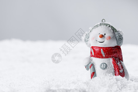 冬季背景的雪人玩具 围巾 庆典 庆祝 可爱的 卡片 场景背景图片