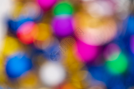 离焦发光的圣诞球节日装饰抽象模糊散景背景效果背景图片