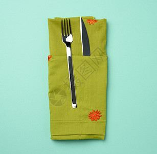 铁叉和刀 绿色背景 午餐 食物 圣诞节 餐厅 用餐 餐具背景图片