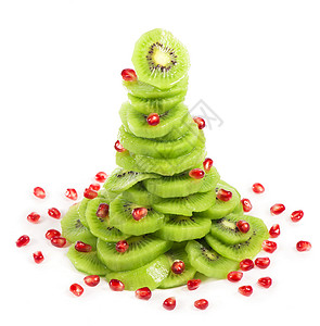圣诞树果色沙拉 带有kiwi和石榴 奇异果 可爱的背景图片