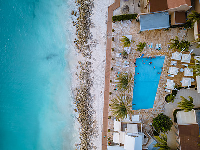 彩虹酒店素材阿鲁巴加勒比海滩上有棕榈树 旅行 自然 马尔代夫 地中海背景